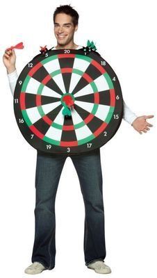 a man holding a dart board and pointing at it