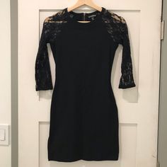 Sleek Black Dress From Express With Lace 3/4 Sleeves And Back Zipper At The Neck. Perfect For Gno Or Date Night! In New Condition, But No Tags. Never Worn. Fitted Mini Dress With Half Sleeves For Night Out, Fitted Half Sleeve Mini Dress For Night Out, Stretch Dress With 3/4 Sleeve For Night Out, Stretch Night Out Dress With 3/4 Sleeve, Stretch Dresses For Night Out With 3/4 Sleeve, Black Mini Dress With 3/4 Sleeve For Night Out, Black Fitted Half Sleeve Dress, Black Fitted Half-sleeve Dress, Fitted Black Half Sleeve Dress