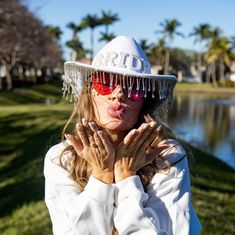 Gather your bridal party and get ready for some fun with our Bride Cowboy Hat with Pearls! This unique and stylish hat is the perfect accessory for any bachelorette party or bridal shower, ensuring the bride-to-be stands out. Features: Chic cowboy hat adorned with elegant pearlsComfortable fit for all-day wearIdeal for bachelorette parties, bridal showers, and bridesmaids proposalsThis hat is a great way to add a touch of western flair to your celebrations. Whether you’re hitting the town with y White Fedora Costume Hat For Party, White Adjustable Hat For Bachelorette Party, Adjustable White Mini Hats For Bachelorette Party, White Fedora Mini Hat For Party, Bride Cowboy Hat, Hat With Pearls, Mens Pjs, Kids Robes, Womens Pjs