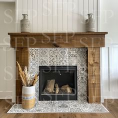 a fireplace in a living room with white walls and wood trimming on the mantle