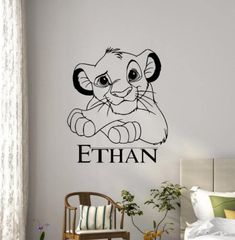 a wall decal with the name ethan on it and an image of a lion