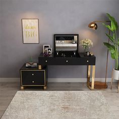 a living room with a rug, table and lamp on the floor next to it