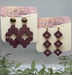 Indulge in the delicate elegance of our handmade lightweight polymer clay earrings, meticulously crafted in a soft mauve tone with a luxuriously sanded finish. Each pair adorned with subtle gold accents, they exude a timeless charm and sophistication. Whether you prefer the graceful sway of dangle earrings or the understated allure of studs, these versatile pieces are sure to elevate any ensemble with their unique artisanal flair. Treat yourself or a loved one to a touch of artisan luxury that seamlessly combines style and comfort. Elegant Clay Drop Earrings, Elegant Purple Polymer Clay Earrings, Purple Polymer Clay Drop Earrings, Earring Collection, Earrings Collection, Stud Earring, Polymer Clay Earrings, Gold Accents, Clay Earrings