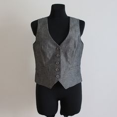 "Grey Vest Linen Blend Vest Women's Gray Vest Linen Top Linen Waistcoat Gilet for Women Large Size Label size: EUR 38 /MEDIUM Measurements (lying flat): Length(back): 18.5\"/ 47 cm Pit to pit: 18\"/ 46 cm Waist: 16 3/4\"/ 43 cm Please check measurements to insure a proper fit. Remember to allow yourself some extra room for movement. You can compare these with something from your closet that fits you well. Please convo me if you need additional measurements. Condition: Great Vintage Condition. Material: 55% linen, 29% polyester, 16% viscose SHIPPING * I ship worldwide via Priority mail (Latvijas Pasts) from Latvia (EU). * Items are shipped 1 - 3 business days after receiving the payment. * Friday night orders and Saturday orders are sent Monday morning. * I ship from Europe, so please allow Cheap Casual Gray Vest, Cheap Gray Tank Vest, Luxury Gray Sleeveless Vest, Cheap Fitted Gray Vest, Cheap Gray Cotton Vest, Affordable Gray Fitted Vest, Cheap Gray Women's Vest, Cheap Gray Vest Top, Womens Gray Vest