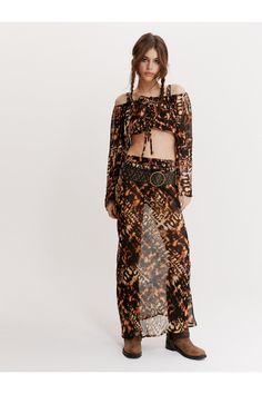 Catching flights. Feel fierce in our maxi beach skirt, made in lightweight sheer fabric breathable for those warm summer days. The skirt features a sleek relaxed silhouette, flattering high waited design, and easy-to-wear elasticated waist detail. The skirt cover up drapes down elegantly to the ankle and features an on-trend animal print design throughout. Style yours with the matching beach top or a simple bikini top and sandals for a stellar vacation look that will take you from the beach to cocktail bars. Animal Maxi Beach Skirt Lightweight Sheer Fabric Flattering Relaxed Silhouette Statement Cheetah Print Design Comfortable High Waistline Elasticated Waistband Model wears a size S (US size 6/UK size 10). Cheetah Print Design, Catching Flights, Beach Maxi Skirt, Holiday Outfits Women, Skirt Coverup, Cocktail Bars, Coverup Skirt, Oasis Fashion, Beach Skirt