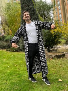 Crochet Black White Granny Square Men Jacket This Unisex patchwork afghan bohemian coat is a very stylish and great product for daily use. Also a great gift for your family and friends.🎁 📏Size of the cardigan in the photo: US size : 44-46(L-XL) 📏The length of the cardigan in the photo is 130cm (51 inches). 📏Models height is 5'11″ (180 cm). Made of highest quality cotton, and anti allergic yarn. Wash Instructions: Machine washable at low temperatures. (30 C / 86 F)🫧. It takes around 7-14 day Black Long Sleeve Patchwork Cardigan, Black Oversized Bohemian Sweater, Oversized Black Bohemian Sweater, Bohemian Oversized Black Sweater, Black Bohemian Long Outerwear, Black Long Bohemian Outerwear, Casual Long Patchwork Outerwear, Casual Long Sleeve Cardigan For Festivals, Bohemian Black Outerwear With Patchwork