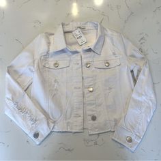 Pinc Premium White Denim Distressed Jean Jacket Size: Youth Large Color: Distressed White New!!! Never Worn With Original Tags, No Damages, In Perfect Condition Trendy White Button-up Cropped Jacket, Trendy White Cropped Jacket With Button Closure, Casual White Button-up Cropped Jacket, Casual White Cropped Jacket For Spring, White Denim Jacket With Frayed Hem For Fall, Trendy White Cropped Jacket For Spring, White Distressed Denim Jacket, Trendy White Denim Jacket With Frayed Hem, Casual White Outerwear With Frayed Hem