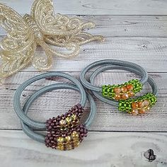 "Original beaded hair ties. This hair jewelry will be a great ponytail holder at the party. cute hair ties are perfect for teenage girl gifts 10th birthday girl, 13th birthday girl, or other holidays. These beaded hair ties are simple, comfortable, and cute at the same time. Very chic ponytail holders that are great for everyday wear or special occasions. Hair ties sold in a set of 2 pieces. Great for kids or adults. Elastic made of high-quality microfiber.  Approximate diameter of elastic tape Phone Cord Hair Tie, Beaded Hairties, Spiral Hair Ties Aesthetic, Cute Hair Ties, Bracelet Hair Tie, Elastic Ribbon Hair Ties, Chic Ponytail, Bead Hair, Beaded Hair Clips