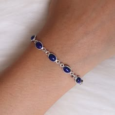 "Lapis Lazuli Bracelet, 925 Solid Sterling Silver Bracelet, Handmade Bracelet, September Birthstone, Women Silver Jewelry, Hippie Bracelet Gemstone Name - Lapis Lazuli Stone Quality - AAA Bracelet Weight - 5.60  gm Stone Length - 0.6 cm  Stone Width - 0.3 cm  Length - 6 inch to 9 inch sizes are available, we give 0.5 inch adjustable in the size which you order ( NOTE - 0.5 INCH ADJUSTABLE IS INCLUDED IN YOUR ORDERED SIZE ) Stone Shape - As shown in the picture You'll get the exact product as sho Women Jewelry Silver, Sapphire Sterling Silver Bracelet, Sapphire Sterling Silver Bracelets Gift, Sapphire Sterling Silver Bracelet Gift, Sapphire Sterling Silver Bracelet For Gift, Elegant Blue Sterling Silver Bracelet Stamped 925, Elegant Blue Sterling Silver Bracelet, Dainty Sterling Silver Bracelets With Natural Stones, Sterling Silver Crystal Bracelet With Natural Stones