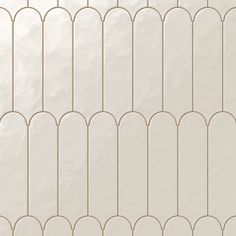 an image of a white wall that is in the shape of a trellis pattern