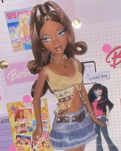 a barbie doll is standing in front of a wall with stickers on it's back