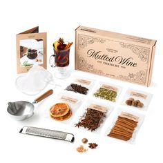 an assortment of spices and seasonings are displayed in front of a box with its contents