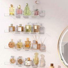 the shelves are filled with different types of perfumes