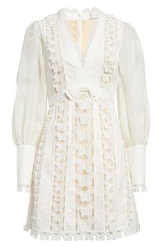 Vertical panels of three-dimensional lace butterflies bring delightful romanticism to this balloon-sleeve dress cut from crisp linen-and-silk organza. Scalloped lace frames the neckline, while a neat bow centers the Empire waist. 35" length (size 1/6) Hidden back-zip closure V-neck Long sleeves with hidden-zip cuffs Lined, except sleeves 100% linen Dry clean Imported Partially lined Designer Clothing Elegant Lace Organza Dress For Spring, Luxury Spring Dress With Sheer Sleeves, Luxury Dress With Sheer Sleeves For Spring, Luxury Dresses With Sheer Sleeves For Spring, Elegant Dresses With Lace Patchwork And Organza, White Organza Lace Dress, White Organza Lace Dress Elegant Style, Elegant White Lace Dress With Organza, Elegant Puff Sleeve Lace Dress