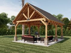 an outdoor living area with furniture and a covered gazebo in the middle of grass