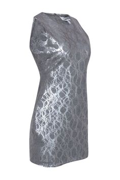 Get ready for a hot night out in Miami with this frock from Elizabeth & James! A hot cocktail dress in a grey hue and funky metallic abstract print in a sultry silhouette, this dress is sure to make you sizzle. Go for a stylish South Beach look with silver-toned heels and a sparkly clutch. Size 8 Shell: 48% Polyester, 47% Viscose, 5% Spandex Lining: 48% Polyester, 47% Viscose, 5% Spandex Sliver-toned back zipper Lined Bodycon silhouette Scoop neckline Sleeveless Bust 32” Waist 28" Shoulder to he Gray Stretch Mini Dress For Party, Fitted Metallic Silver Dress For Holidays, Metallic Silver Fitted Dress For Holiday, Gray Bodycon Dress For Party, Glamorous Gray Dress For Night Out, Gray Fitted Dress For Party Season, Fitted Gray Dress For Night Out, Chic Gray Bodycon Dress For Party, Gray Fitted Holiday Dresses