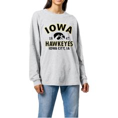 Channel your Iowa Hawkeyes pride with a vintage twist in this Throwback T-Shirt. This oversized tee provides a roomy, relaxed feel with a rounded hemline for added comfort. Featuring a vintage football jersey-inspired front and back yoke seam, this shirt blends classic style with modern comfort. Collegiate Oversized Top With Graphic Print, Oversized Collegiate Top With Graphic Print, Collegiate Oversized Tops With Logo Print, Collegiate Style Graphic T-shirt For Fall, College Logo Print T-shirt For Fall, Iowa Hawkeyes, Oversized Long Sleeve, Vintage Football, Football Jersey