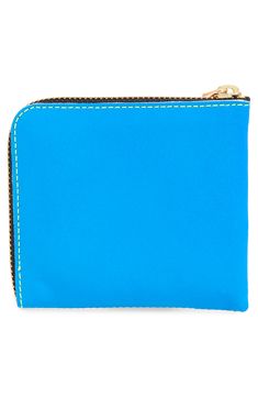 Electric-hued leather with a sleek, modern matte finish shapes the clean curves and slim profile of this compact zip-around wallet. Style Name:Comme Des Garçons Super Fluo Half Zip Wallet. Style Number: 6085755. Available in stores. Modern Compact Wallet With Zipper, Modern Compact Coin Purse With Zipper Closure, Modern Compact Wallets With Zipper Pouch, Modern Bifold Wallet With Zipper Closure, Modern Bifold Wallet With Zipper Pouch, Zip Wallet, Coin Pouch, Leather Pouch, Comme Des Garcons