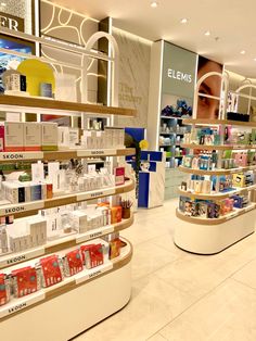 the inside of a pharmacy store with shelves full of products