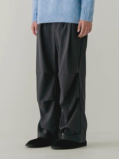 Editor's notesIt is a casual parachute pant with pleats on the front. The pant is made with three-dimensional pattern and wide fit silhouette. It has elastic band on the waist and pleats on the front and knees for comfy fit.- Relaxed fit- Button and zipper closure- Side pockets- Back pocketsMeasurements(in.)Size 2(M) / 3(L)- Waist: 14.4-18.3 in. / 15.4-19.3 in.- Rise: 12.8 in. / 13.4 in.- Thigh: 14.2 in. / 14.6 in.- Hem: 10.4 in. / 10.8 in.- Length: 40.9 in. / 41.3 in.*Model info: Height 6’ 2” W Baggy Pleated Wide-leg Pants, Casual Black Pleated Wide Leg Pants, Casual Black Wide Leg Pleated Pants, Casual Bottoms With Accordion Pleats, Casual Solid Pleated Pants, Casual Bottoms With Accordion Pleats For Fall, Casual Accordion Pleats Bottoms For Fall, Casual Pleated Baggy Bottoms, Black Casual Pleated Pants