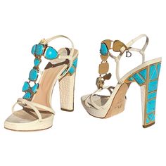 Christian Dior *Piedra* Leather Turquoise Jeweled Sandals Italian size - 37.5 White alligator print leather, Turquoise embellishment, Gold tone metal detail, "D" charm hangs from both buckles, Platform. Heel height - 5 inches, Platform - 0.75 inches. Made in Italy. Almost new condition - store display. No original box. White Alligator, Dior Heels, Turquoise Heels, Turquoise Sandals, Cute Shoes Heels, Alligator Print, Heart Shoes, Fashion Design Collection, Jeweled Sandals