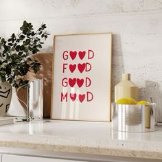 a white shelf topped with vases filled with flowers next to a framed art print