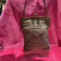 D E S C R I P T I O N This Is A Vintage 60s Art Deco Pouch Bag . Features A Beautiful Beaded Design And Glittery Pouch M E A S U R E M E N T S Bag Length: 7 In Bag Strap Drop: 13 In Bag Width: 5.5 In Bag Height: 7 In Authenticity Guarantee All Bags Sold In Our Shop Are 100% Guaranteed Authentic Or Your Money Back. Vintage Embellished Pouch Bag, Vintage Embellished Rectangular Bag, Vintage Embellished Clutch Shoulder Bag, Vintage Embellished Rectangular Shoulder Bag, Vintage Embellished Bag For Everyday Use, Handmade Retro Shoulder Bag For Evening, Vintage Embellished Evening Bag, Vintage Rectangular Sequined Bags, Vintage Rectangular Evening Bag With Sequins