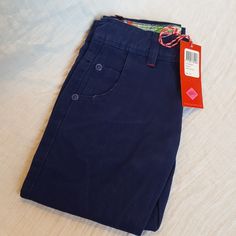 Oilily Brand New With Tags, Dark Blue Pants Size 110 Jeans. 3 Button Detail At The Ankle. Adjustable At The Waist With Internal Elastic. Small Red Detailing Smoke-Free Pet Friendly Casual School Bottoms With Button Closure, Casual Blue Chinos With Pockets, Blue Cotton Jeans With Buttons, Casual Navy Bottoms For School, Navy Cotton Bottoms For School, Navy Casual School Bottoms, Navy Cotton School Bottoms, Casual Blue Bottoms With Button Zip Fly, Blue Bottoms With Pockets For School