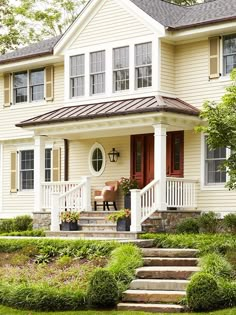 a house with steps leading up to the front door