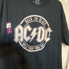 the back in black ac dc t - shirt is on display