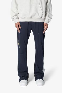 the Contrast Bootcut Sweatpants are designed with a relaxed fit throughout, featuring an elasticized self waist and leg opening, multi-colored paint splatter throughout, and finished with denim and contrasting panels at the inseam and outseam to provide a flare at the leg opening. details relaxed fit flared leg opening 55% cotton 45% polyester model is 6’1, 140 lbs and wears a size medium Bootcut Sweatpants, Pale Tan, 140 Lbs, Denim Cargo Pants, Fuzzy Cardigan, Denim Patches, Denim Flares, Paint Splatter, Grey Hoodie