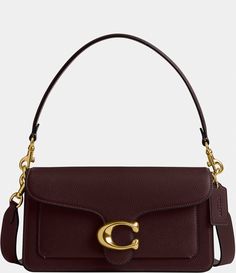 From COACH, the Tabby 26 Pebble Leather Gold Tone Shoulder Bag features: Polished pebble leatherSnap closureLeather liningInside zip, multifunction pocketsDetachable short strapDetachable long strap for shoulder/crossbody wearApprox. 10.25" L x 6" H x 3.25" W bag; 7" short strap drop; 21" long strap drop Imported. Burgundy Coach Bag, Fall Coach Bag, Designer Shoulder Bags For Women, Maroon Shoulder Bag, Fall Handbags 2024, Classic Bags Timeless, Coach Bah, Cute Coach Bags, Coach Tabby Bag