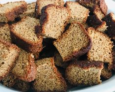 a white bowl filled with slices of bread