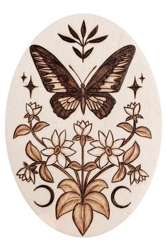 a wooden plaque with an image of a butterfly and flowers in the center, on a white background