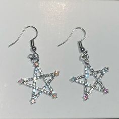 Sparkle Star Silver Earrings 1 Pair Star Earrings Condition: New Size: Star About 2cm X 2.5cm - Sparkle Star Earrings - Great For Any Occasions No Brand/Unbranded Any Question Please Ask Before Purchase Free Gift On Order Over $100 Before Shipping Open For Reasonable Offer Bundle To Save On Shipping, Message Me Discount On Bundle Sparkling Star-shaped Crystal Earrings, Sparkling Star-shaped Jewelry For Parties, Star-shaped Crystal Earrings For Party, Silver Star Crystal Earrings, Silver Star-shaped Crystal Earrings For Pierced Ears, Silver Star Crystal Earrings For Pierced Ears, Single Star-shaped Crystal Earring As Gift, Sparkling Star Crystal Earrings For Party, Sparkling Star-shaped Crystal Earrings For Party