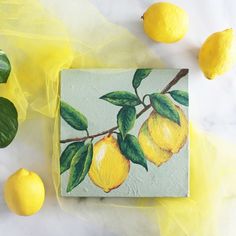 a painting of lemons on a marble surface