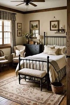 a bed room with a neatly made bed next to a window and a rug on the floor