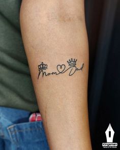 a woman's arm with a tattoo that says mama and dad on the side