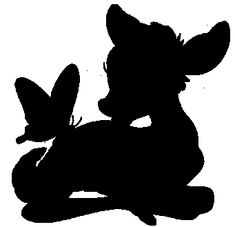 a black silhouette of a dog and butterfly