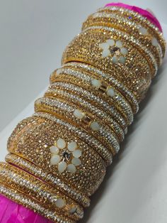 Welcome to a world of exquisite elegance with our collection of stone bangles. Crafted with precision and adorned with natural gemstones, these bangles are a celebration of nature's beauty. Each piece is meticulously handcrafted to capture the essence of the stones, allowing you to carry a piece of the earth's marvels wherever you go. Embrace the allure of these stone bangles, featuring a variety of breath-taking gemstones. From the deep blues of lapis lazuli to the vibrant greens of malachite, Spiritual Multicolor Bangle Bracelet, Elegant Multicolor Stone Bangle, Multicolor Spiritual Bangle Crystal Bracelet, Multicolor Spiritual Crystal Bangle, Multicolor Multi-stone Bangle, Bangles Indian, Stone Bangle, Bangle Set, Shine Bright