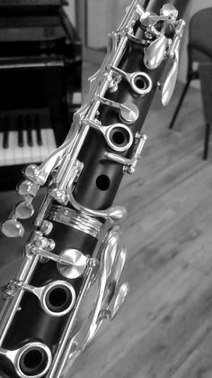 a black and white photo of a flute