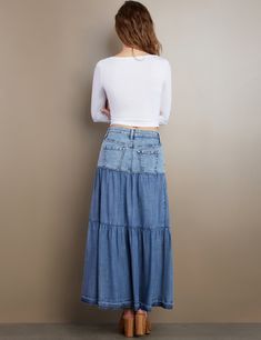 With a jeans-top/layered bottom construction, in our oh-so-soft trademark denim, the Fun Denim Maxi Skirt by Wash Lab is, well, built for fun! Medium Wash Denim Tiered Skirt, Fitted Tiered Denim Skirt, Fitted Cotton Bottoms For Layering, Cotton Bottoms For Layering In Spring, Spring Layering Cotton Bottoms, Medium Wash Tiered Denim Skirt, Fitted Recycled Denim Bottoms For Spring, Casual Tiered Skirt Bottoms For Layering, Casual Tiered Skirt For Layering