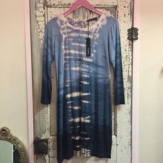 A Comfortable Fitting Dress With Long Sleeves And Keyhole In The Back. Horizontal Alligator Vat-Dye Which Goes Down The Middle. Blue, Navy, And Cream Fabric - 93% Bamboo, 7% Spandex Fabric. Fitted Long Sleeve Tie Dye Dress, Fitting Dress, Cream Fabric, Dress With Long Sleeves, Blue Cream, Spandex Fabric, Fitted Dress, Alligator, Long Sleeve Dress