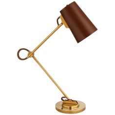 a desk lamp with a brown shade on top of the base and a gold plated metal arm