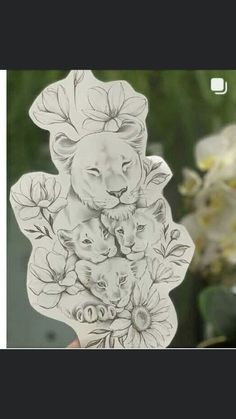 an image of a lion with flowers on it