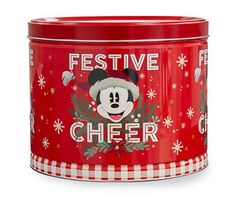 a red canister with mickey mouse's festive cheer written on the side