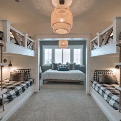 a bedroom with bunk beds and checkered pillows