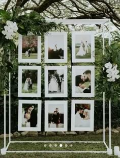 an outdoor wedding ceremony with white flowers and pictures on the wall