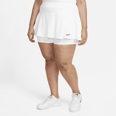 Own the court in this skirt. The flouncy, stretchy design is made from lightweight fabric that's made with at least 75% recycled polyester fibers. A single pleat in the front gives you room to move while you run and slide. White Stretch Tiered Skirt, White Stretch Tiered Tennis Skirt, White Tiered Stretch Tennis Skirt, White Tiered Skort With Elastic Waistband, White Flowy Tiered Tennis Skirt, White Tiered Skort, Nike Fitted Tennis Skirt, White 4-way Stretch Skirt With Built-in Shorts, White Stretch Ruffled Skort