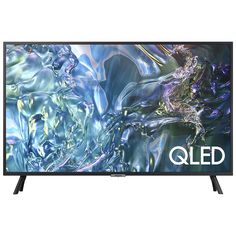 the qled tv is shown with an abstract image in the back ground and white lettering on